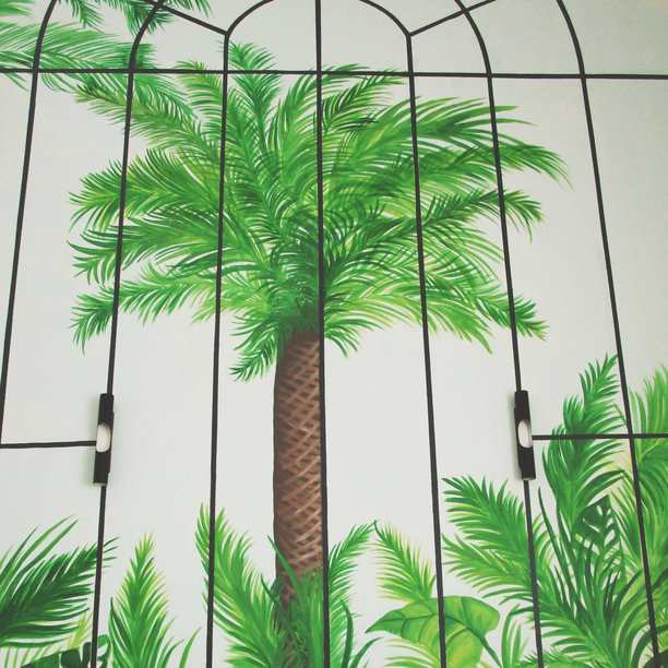 Mural painting in home with palms